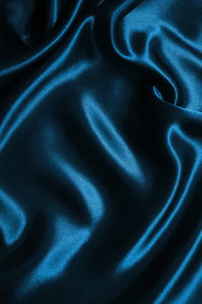 Gładki niebieski elegancki jedwabiu lub satyny jako tło — Zdjęcie stockowe