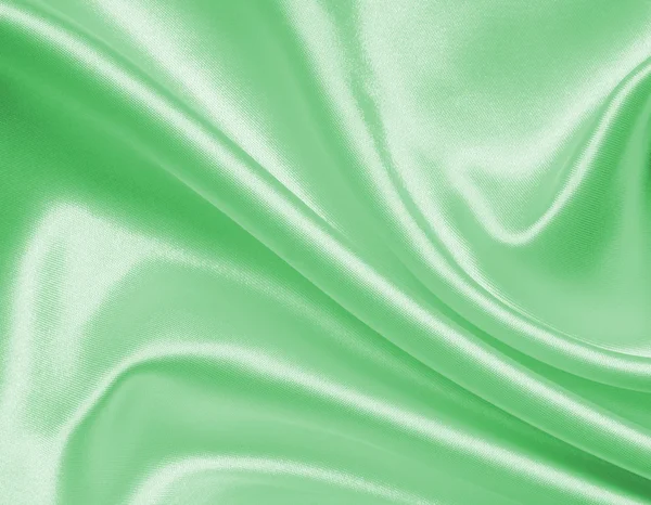 Smooth elegant green silk or satin texture as background — Stock Photo, Image