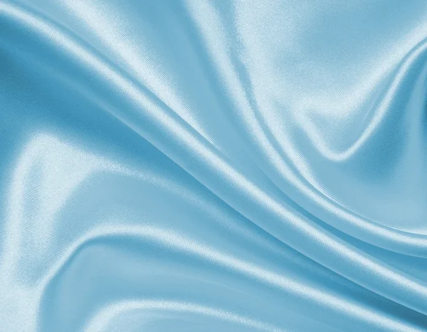 Ομαλή κομψό μπλε μετάξι ή σατέν ως φόντο — Φωτογραφία Αρχείου