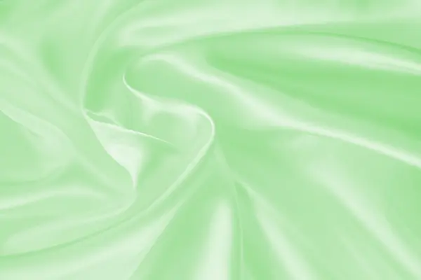 Ομαλή και κομψό πράσινο μετάξι ή σατέν υφή ως φόντο — Φωτογραφία Αρχείου