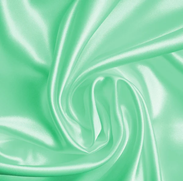 Smooth elegant green silk or satin texture as background — Stock Photo, Image