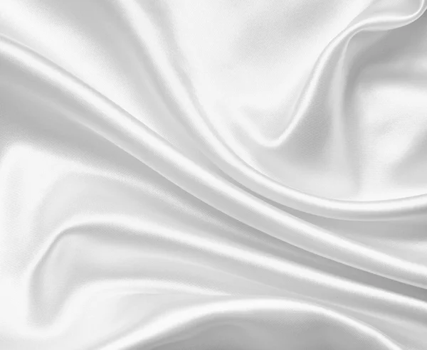 Glatte, elegante weiße Seiden- oder Satin-Textur als Hochzeitshintergrund — Stockfoto