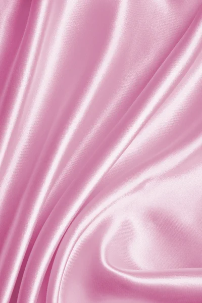 Sima, elegáns rózsaszín selyem, vagy szatén a textúra a háttér — Stock Fotó