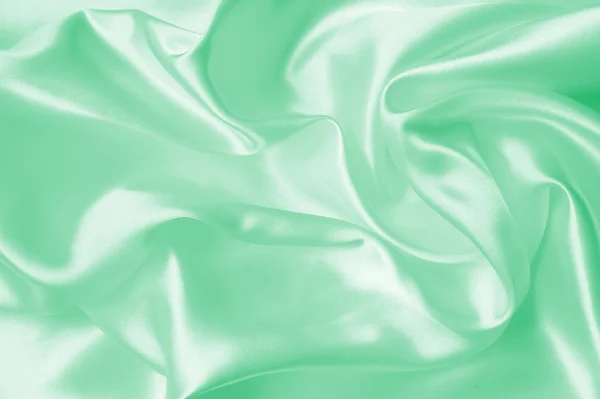 Smooth elegant green silk or satin texture as background — Stock Photo, Image