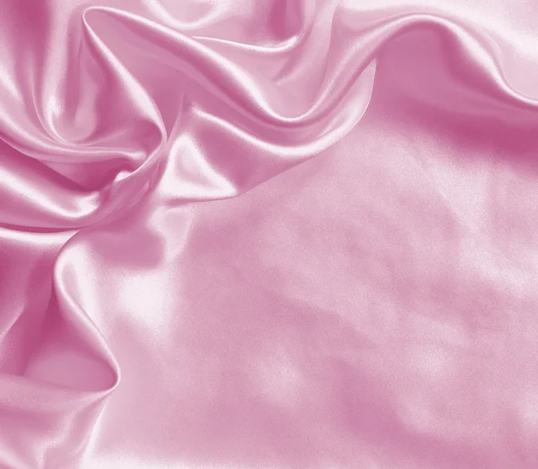 Soepele elegante roze zijde of Satijn textuur als achtergrond — Stockfoto