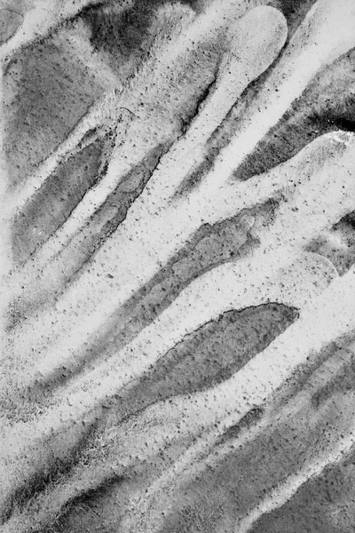 Абстрактная акварель на бумажной фактуре в качестве фона. В чёрном и — стоковое фото