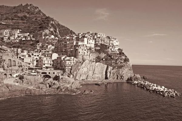 Italy. Cinque Terre. Manarola village. In Sepia toned. Retro sty — Stock Photo, Image