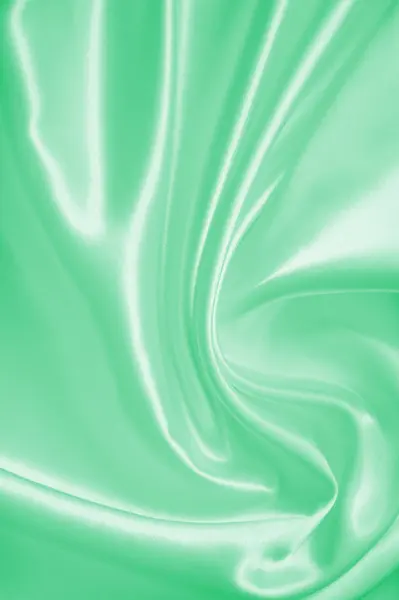 Smooth green silk or satin as background — Stock Fotó