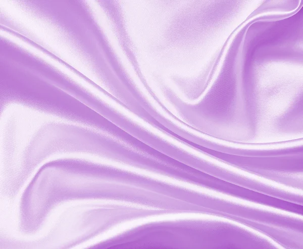 Гладкий элегантный фиолетовый атлас — стоковое фото