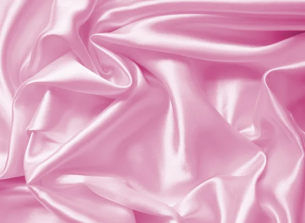 Ομαλή και κομψό ροζ μετάξι ή σατέν υφή ως φόντο — Φωτογραφία Αρχείου