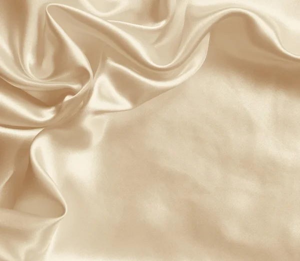 背景として滑らかなエレガントなゴールデン シルク。セピア色のトーン — ストック写真