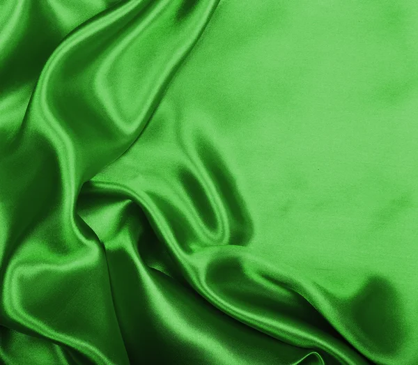 Texture lisse et élégante de soie verte ou de satin comme fond — Photo