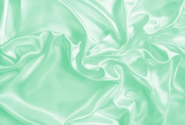 Smooth elegant green silk or satin texture as background — Stock Photo, Image