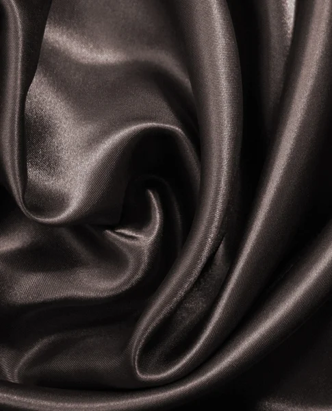 Smooth elegant brown silk or satin as background. In Sepia toned — Stock Photo, Image