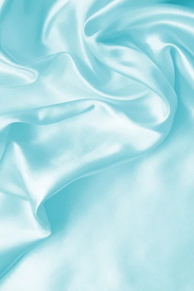光滑的优雅蓝色丝绸或缎子为背景 — 图库照片