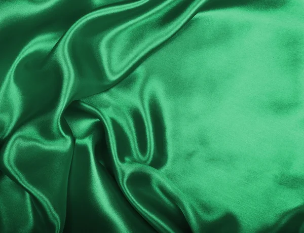 Texture lisse et élégante de soie verte ou de satin comme fond — Photo