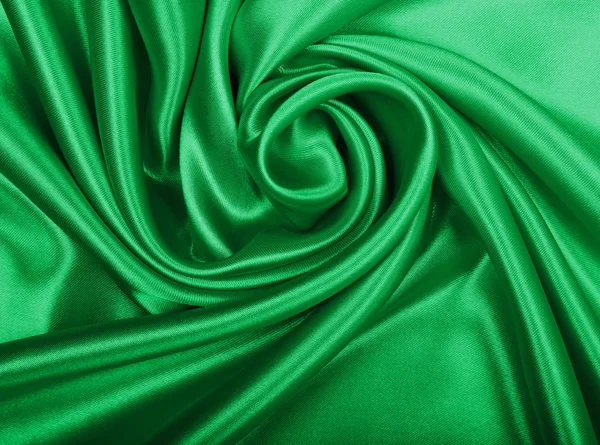 Soepele elegante groene zijde of Satijn textuur als achtergrond — Stockfoto