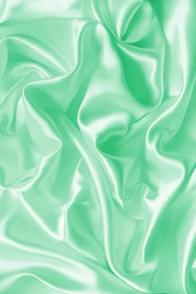 Liscio elegante seta verde o raso texture come sfondo — Foto Stock