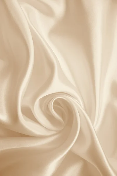 पृष्ठभूमि के रूप में चिकनी सुरुचिपूर्ण सुनहरा रेशम। में Sepia toned — स्टॉक फ़ोटो, इमेज