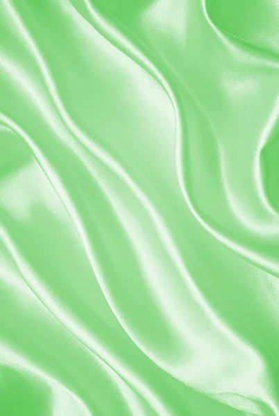 Seda verde elegante suave ou textura de cetim como fundo — Fotografia de Stock