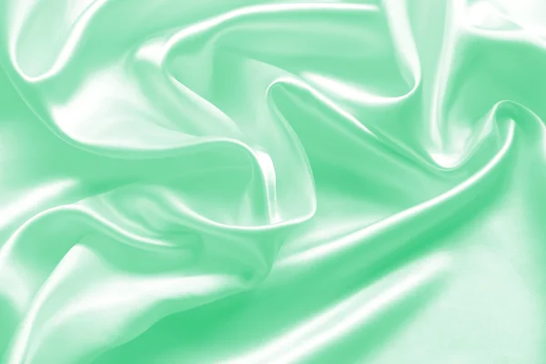 Smooth elegant green silk or satin texture as background — Stock Photo, Image