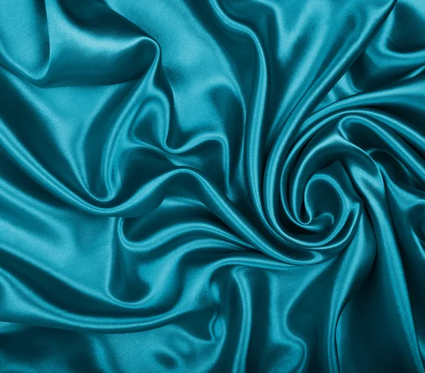 Glatte, elegante blaue Seide oder Satin als Hintergrund — Stockfoto