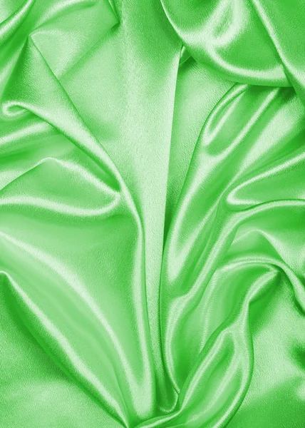 Glat elegant grøn silke eller satin tekstur som baggrund - Stock-foto