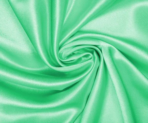 Seda verde elegante suave ou textura de cetim como fundo — Fotografia de Stock