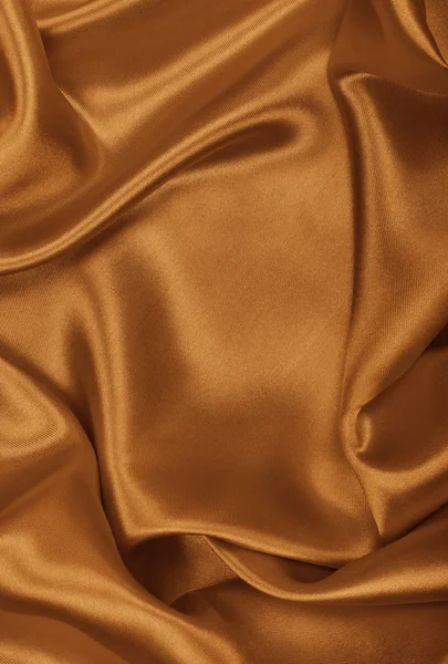 Liso elegante seda dorada o satén como fondo. En tono Sepia — Foto de Stock