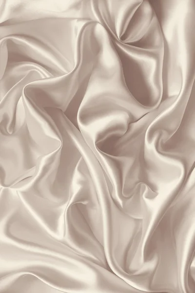 Glat elegant gylden silke eller satin tekstur som baggrund. I Se - Stock-foto