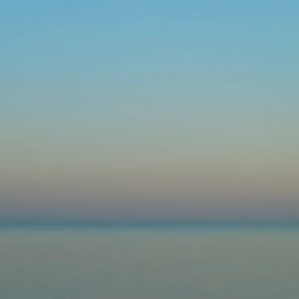 Homályos kép a hajnal, a tenger felett — Stock Fotó