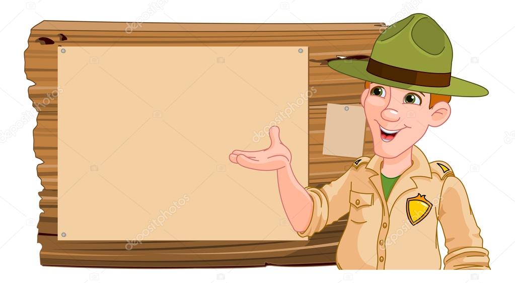 Forest ranger pointing at wooden sign