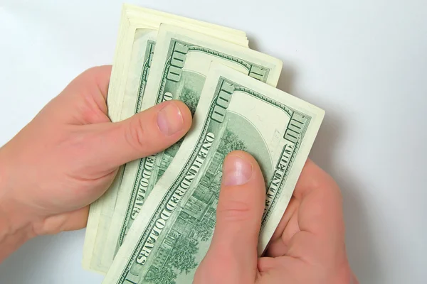 Cash US dollars in hand. — Stock Photo, Image