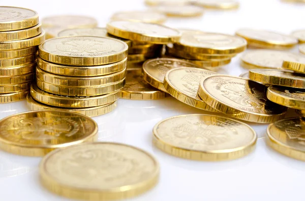 Münzen aus gelbem Metall. — Stockfoto