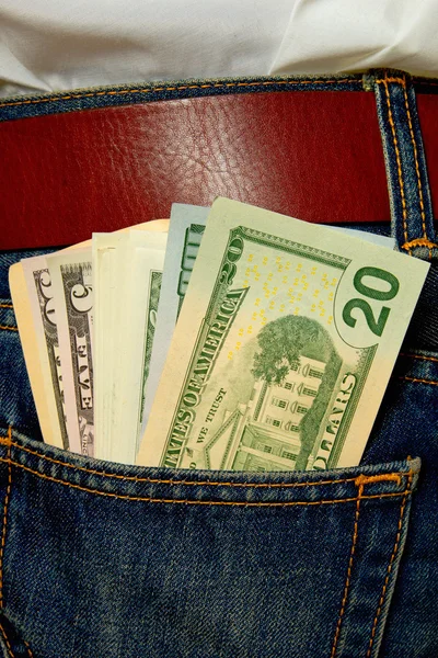 Долари в джинсовій кишені . — стокове фото