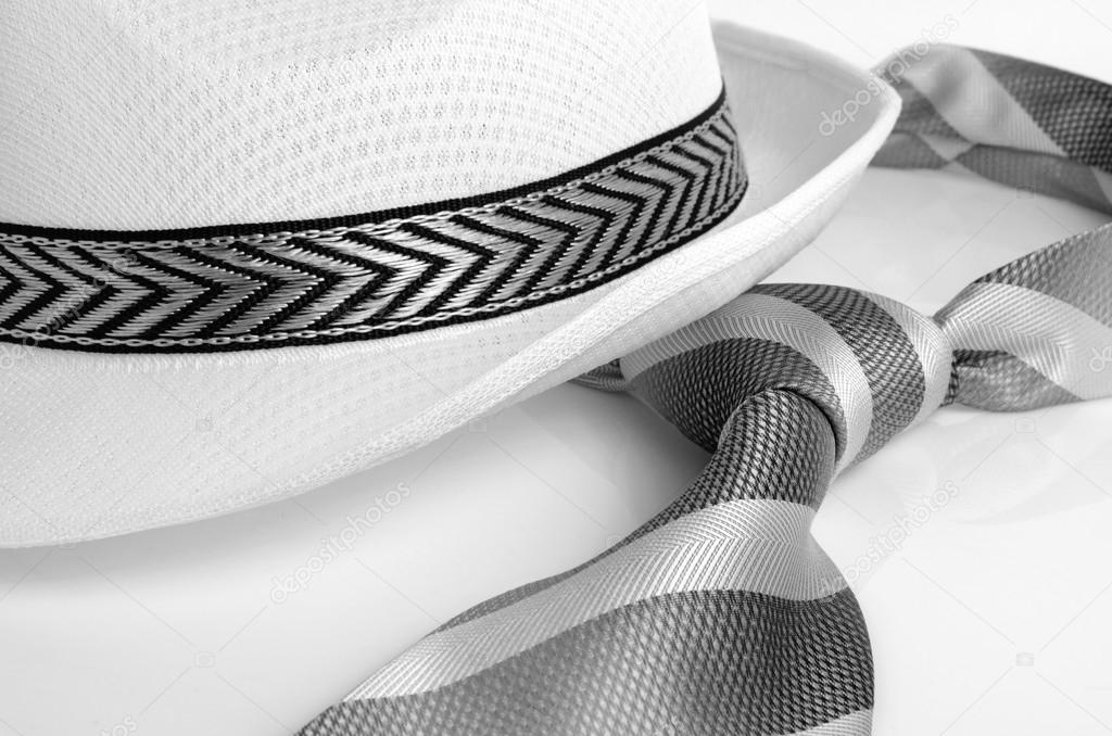 Hat and tie.