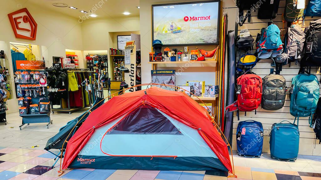 LATVIA, RIGA, AUGUST, 2021 - Marmot international sporting goods retailer in shopping mall, Riga, capital of Latvia. Backpacking Tourism, Travel Adventures Lifestyles