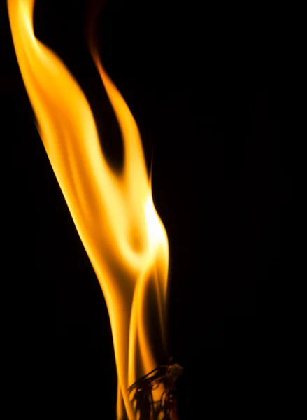 Płomień płonącą świecą — Zdjęcie stockowe
