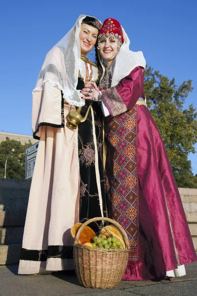 Two cute ladies are in the Armenian suits — Stock Photo, Image