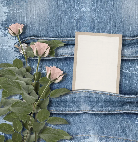 Old denim background with paper frame — Stock Photo, Image