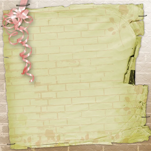 Abstract brick wall with ribbons and bows. — Stock Photo, Image