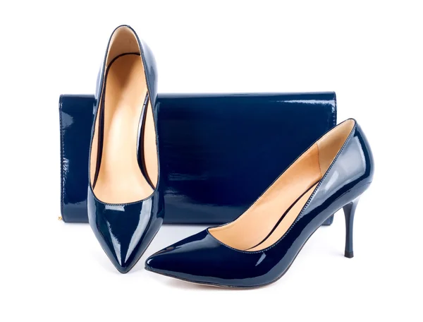 Belle scarpe blu con frizioni su sfondo bianco isolato — Foto Stock