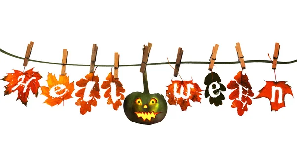 Funny halloween pumpkin, hanging on a rope with colorful autumn — Stock Photo, Image