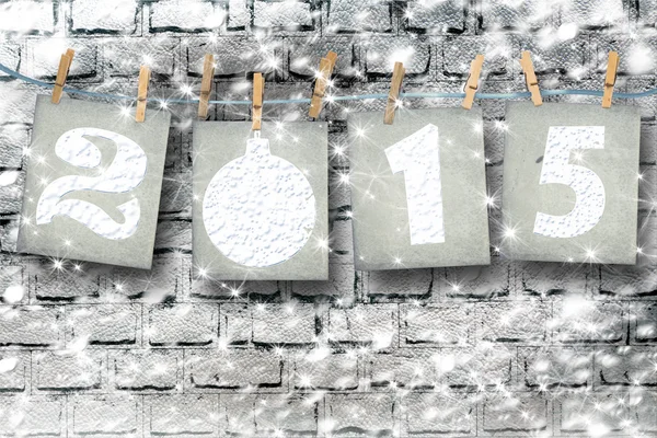 Numeri di carta innevati del nuovo 2015 con neve su bac astratto — Foto Stock