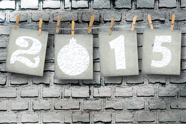 Snow-covered paper numbers of new 2015 with snow on abstract bac — Stock Photo, Image