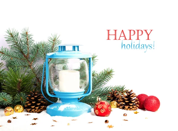 Snowy blue lantern and Christmas balls on the background of fir — Stock Photo, Image