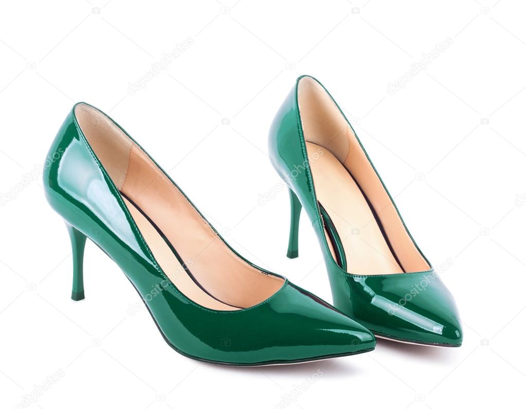 Beautiful green classic women shoes isolated on white background