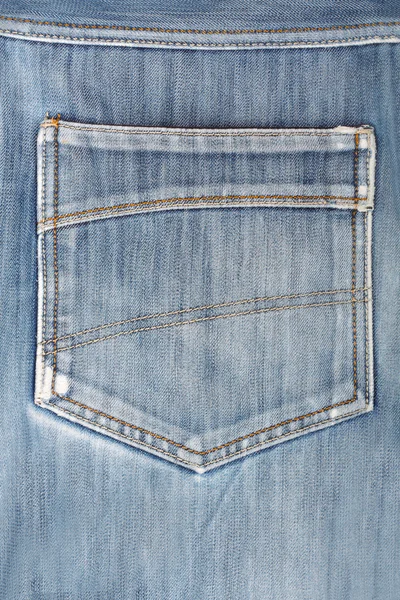 Niebieskie dżinsy z powrotem kieszeni. piękny styl casual — Zdjęcie stockowe