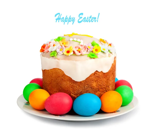 Huevos de Pascua pintados y delicioso cupcake en blanco espalda aislada Fotos De Stock