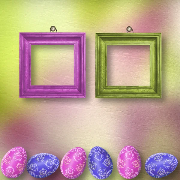 Eier mit Holzrahmen auf pastellfarbenem Hintergrund zeichnen — Stockfoto